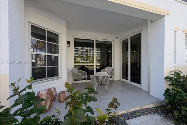 a view of swimming pool with outdoor space and seating area