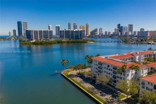 a view of a city with an ocean