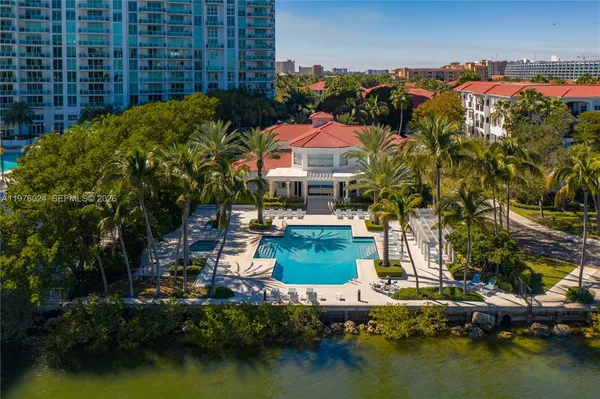 an aerial view of residential houses and outdoor space