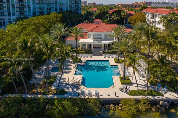 an aerial view of residential houses and outdoor space