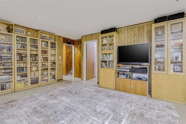 a view of livingroom with furniture and a flat screen tv