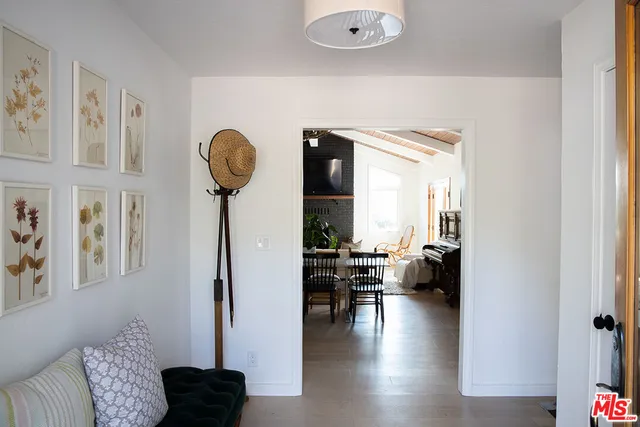 a view of living room filled with furniture and window