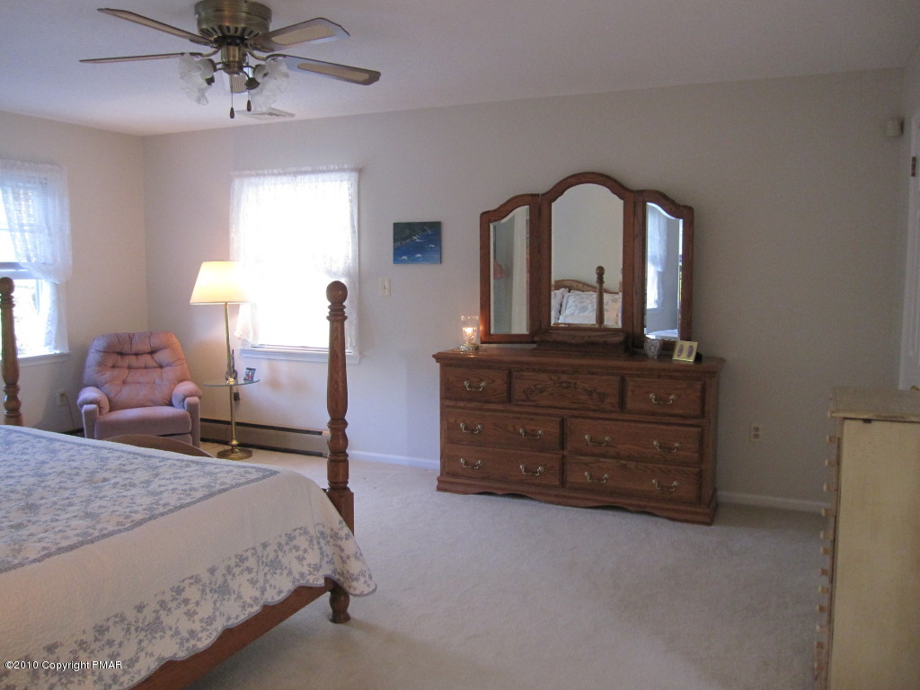 341 Tara Hill Road Bartonsville, PA 18321 - Photo 16 of 23 a bedroom with a bed and a dresser