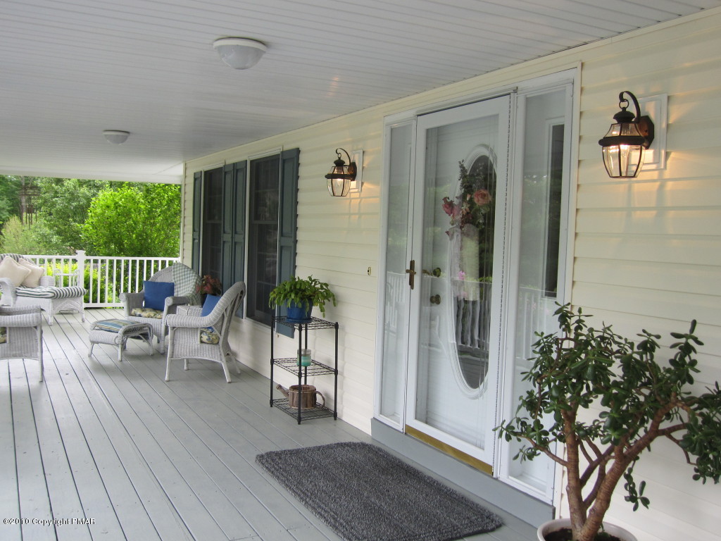 341 Tara Hill Road Bartonsville, PA 18321 - Photo 3 of 23 wooden floor view with a outdoor seating space