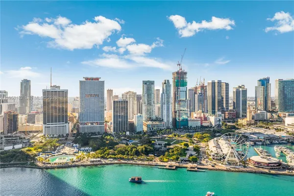 a view of a city with tall buildings