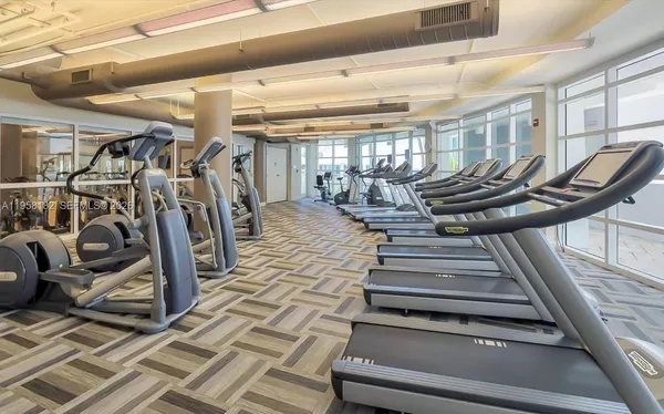 a view of a room with gym equipment