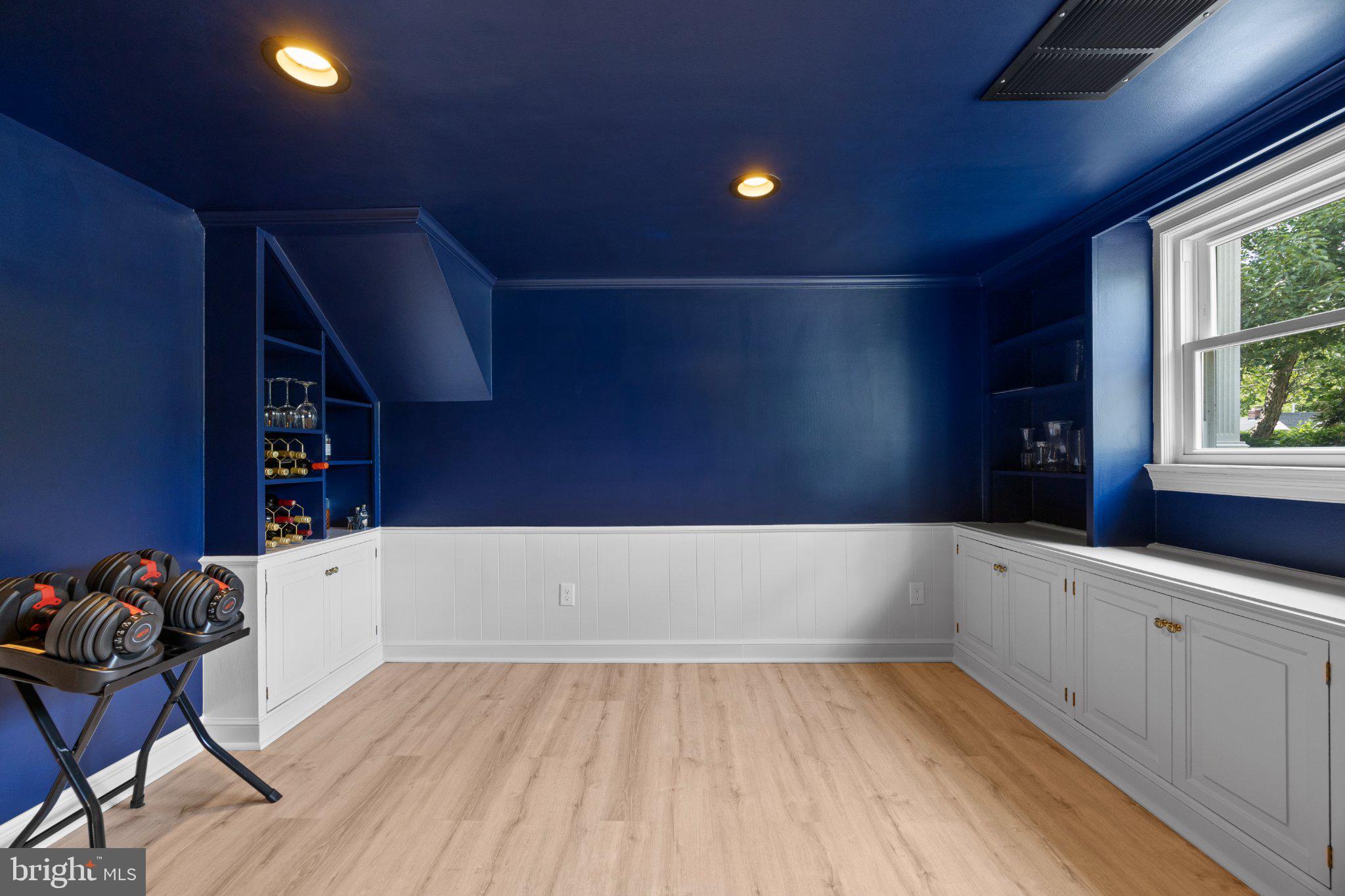 6705 New Hope Drive Springfield, VA 22151 - Photo 43 of 67 Versatile space with bold blue accents.