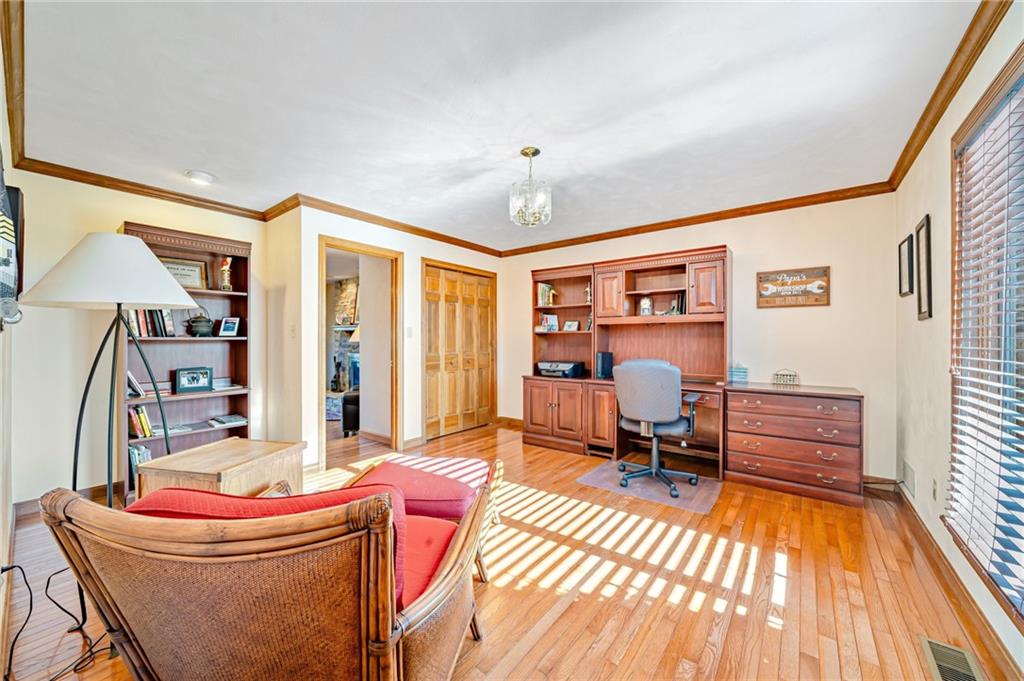 5600 Field Stream Drive Export, PA 15632 - Photo 13 of 43 a living room with furniture a rug and a chandelier