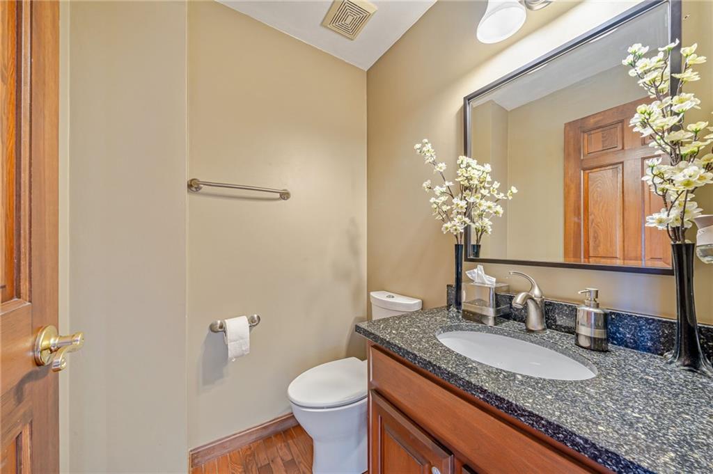 5600 Field Stream Drive Export, PA 15632 - Photo 14 of 43 a bathroom with a granite countertop sink a toilet and a mirror