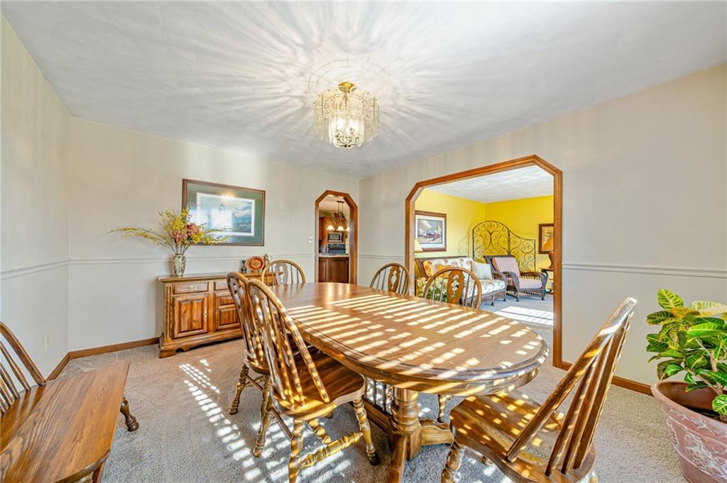 5600 Field Stream Drive Export, PA 15632 - Photo 16 of 43 a view of a dining room with furniture and chandelier