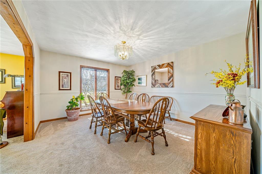 5600 Field Stream Drive Export, PA 15632 - Photo 17 of 43 a view of a dining room with furniture and chandelier