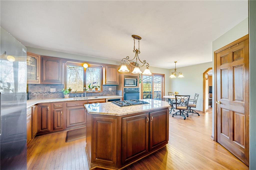 5600 Field Stream Drive Export, PA 15632 - Photo 18 of 43 a kitchen with lots of counter top space and painting on the wall
