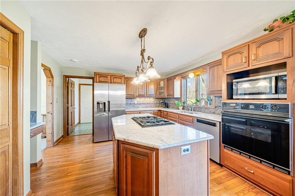 5600 Field Stream Drive Export, PA 15632 - Photo 19 of 43 a kitchen with stainless steel appliances granite countertop a stove and a refrigerator
