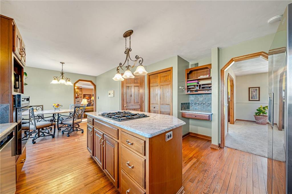 5600 Field Stream Drive Export, PA 15632 - Photo 22 of 43 a kitchen that has a lot of cabinets a sink and a wooden floor