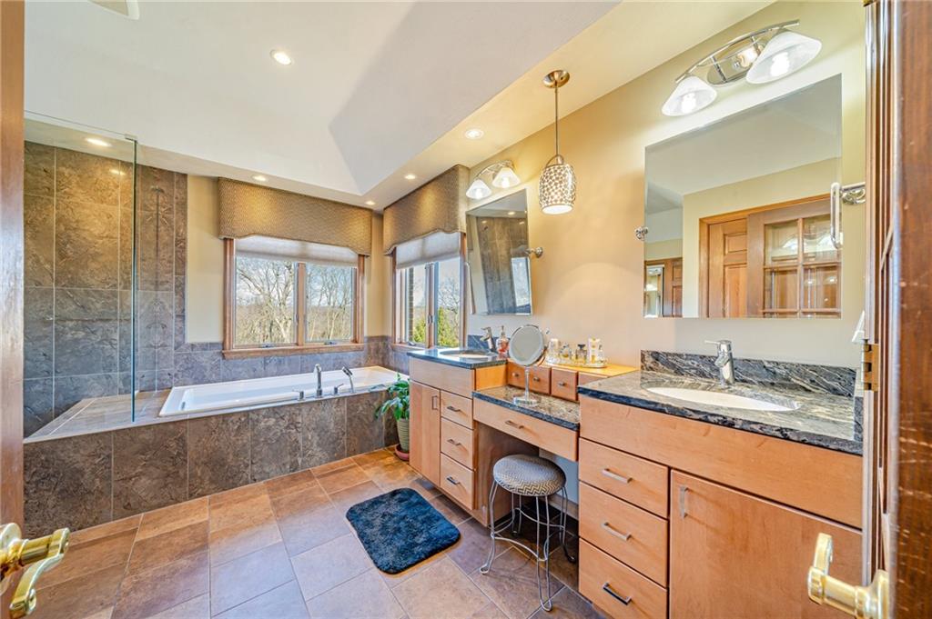 5600 Field Stream Drive Export, PA 15632 - Photo 31 of 43 a spacious bathroom with a sink mirror double vanity and bathtub