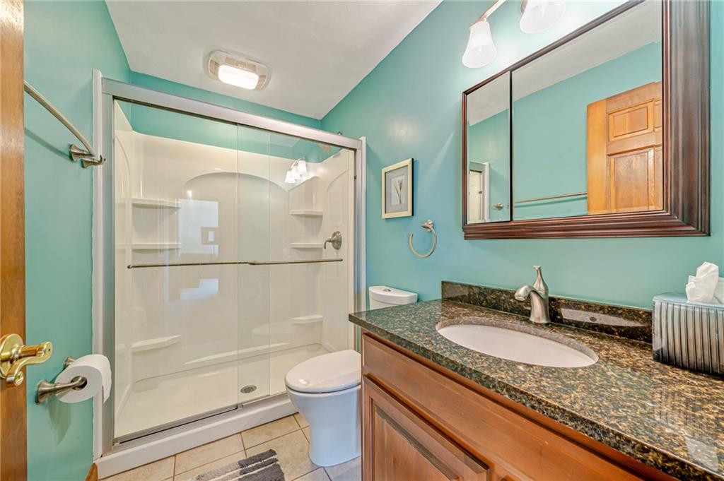 5600 Field Stream Drive Export, PA 15632 - Photo 36 of 43 a bathroom with a granite countertop sink toilet and shower