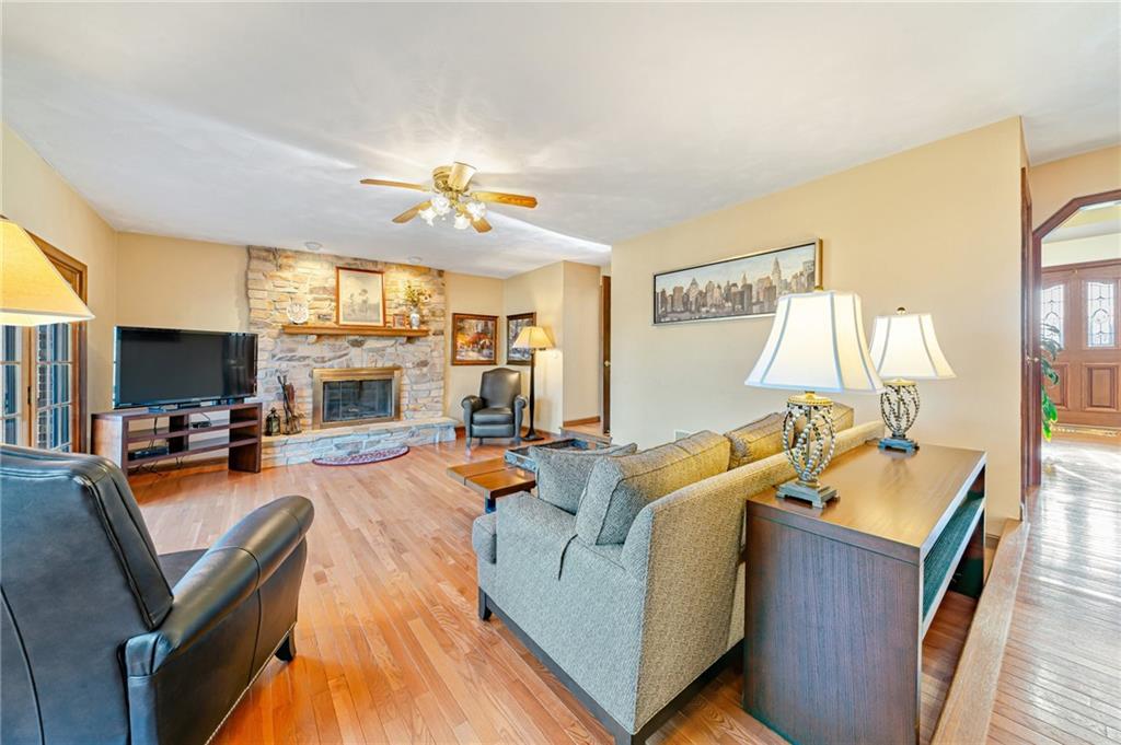 5600 Field Stream Drive Export, PA 15632 - Photo 8 of 43 a living room with furniture fireplace and a flat screen tv