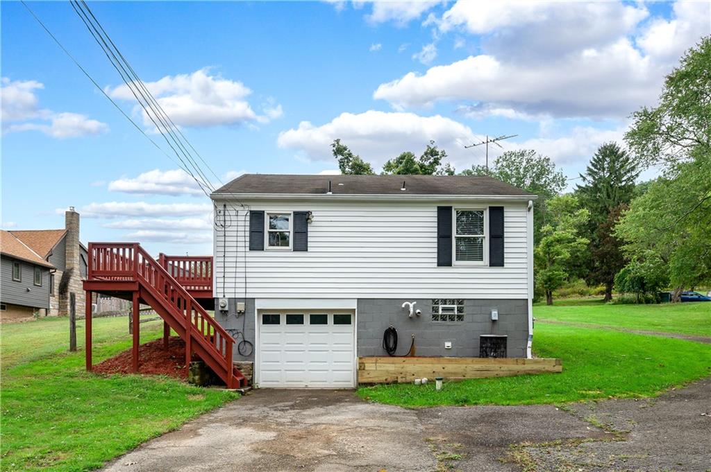 226 Kilgallen Road Butler, PA 16002 - Photo 24 of 38 a front view of house with yard outdoor seating and barbeque oven