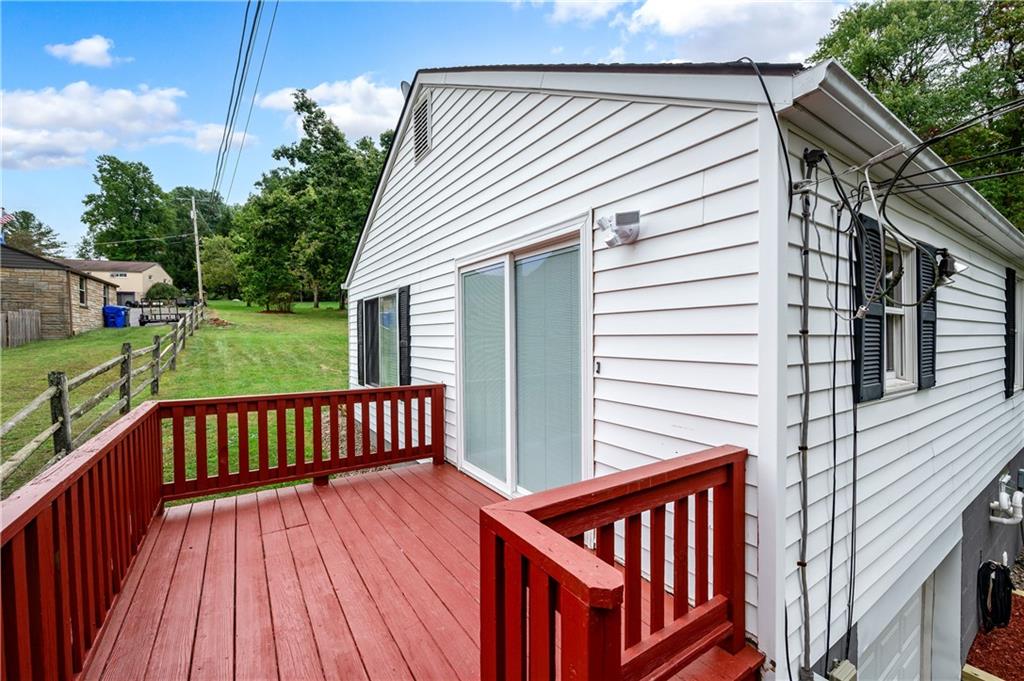 226 Kilgallen Road Butler, PA 16002 - Photo 26 of 38 a view of a wooden deck with a patio