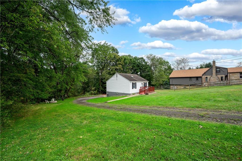 226 Kilgallen Road Butler, PA 16002 - Photo 28 of 38 a view of a house with backyard and garden