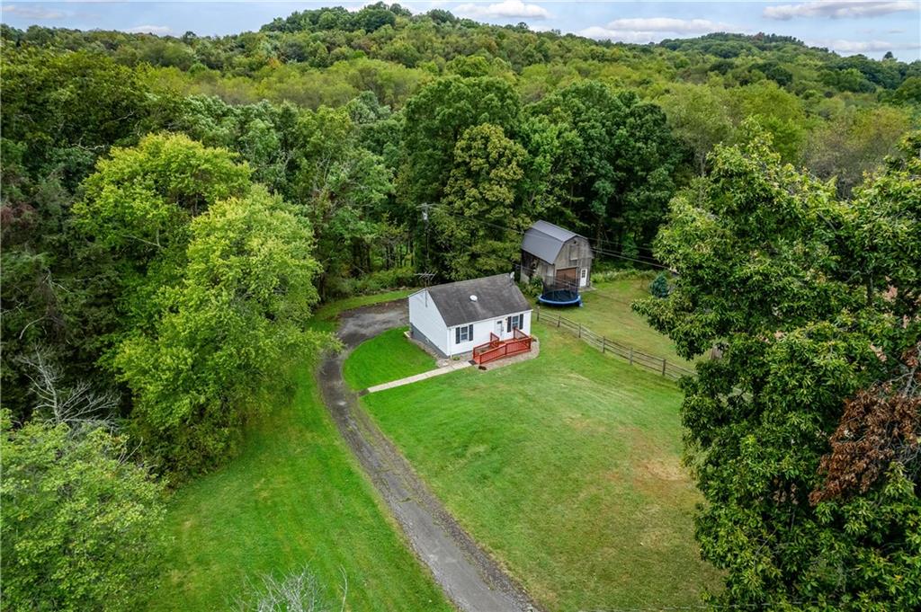 226 Kilgallen Road Butler, PA 16002 - Photo 3 of 38 a view of a house with a backyard