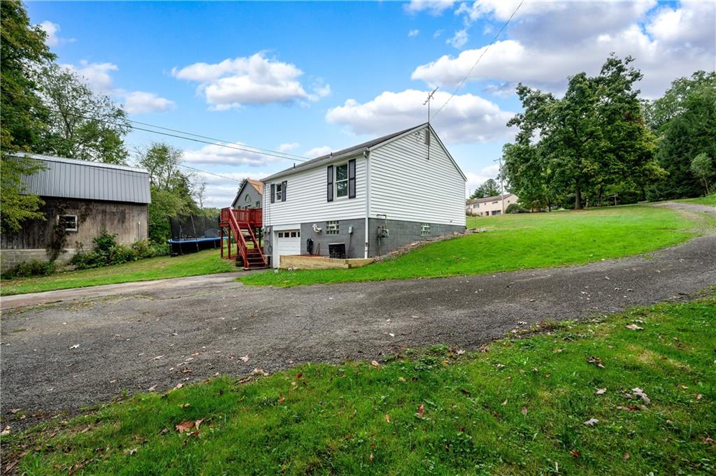 226 Kilgallen Road Butler, PA 16002 - Photo 35 of 38 a view of a house with a yard and large tree
