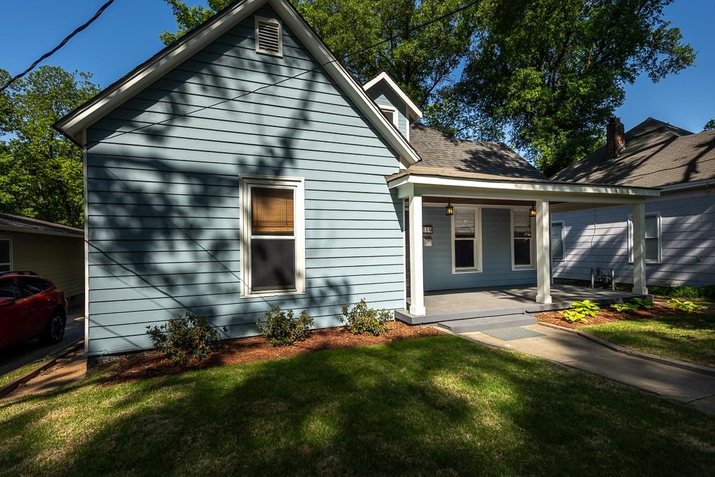 119 South Fenwick Road Memphis, TN 38111 - Photo 5 of 28 a front view of a house with a yard