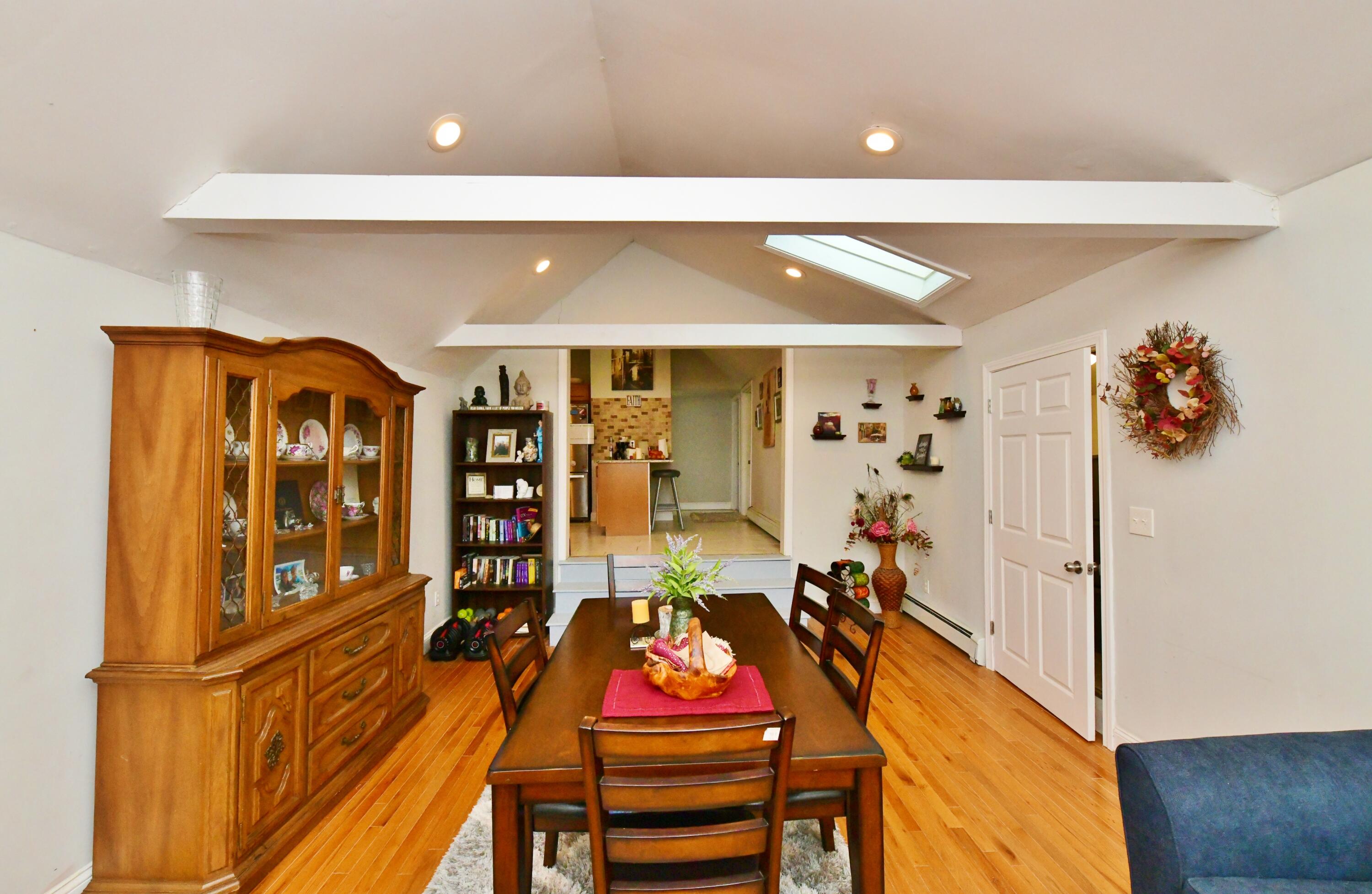 26 Old Monument Neck Road Bourne, MA 02532 - Photo 12 of 51 a living room with furniture and wooden floor