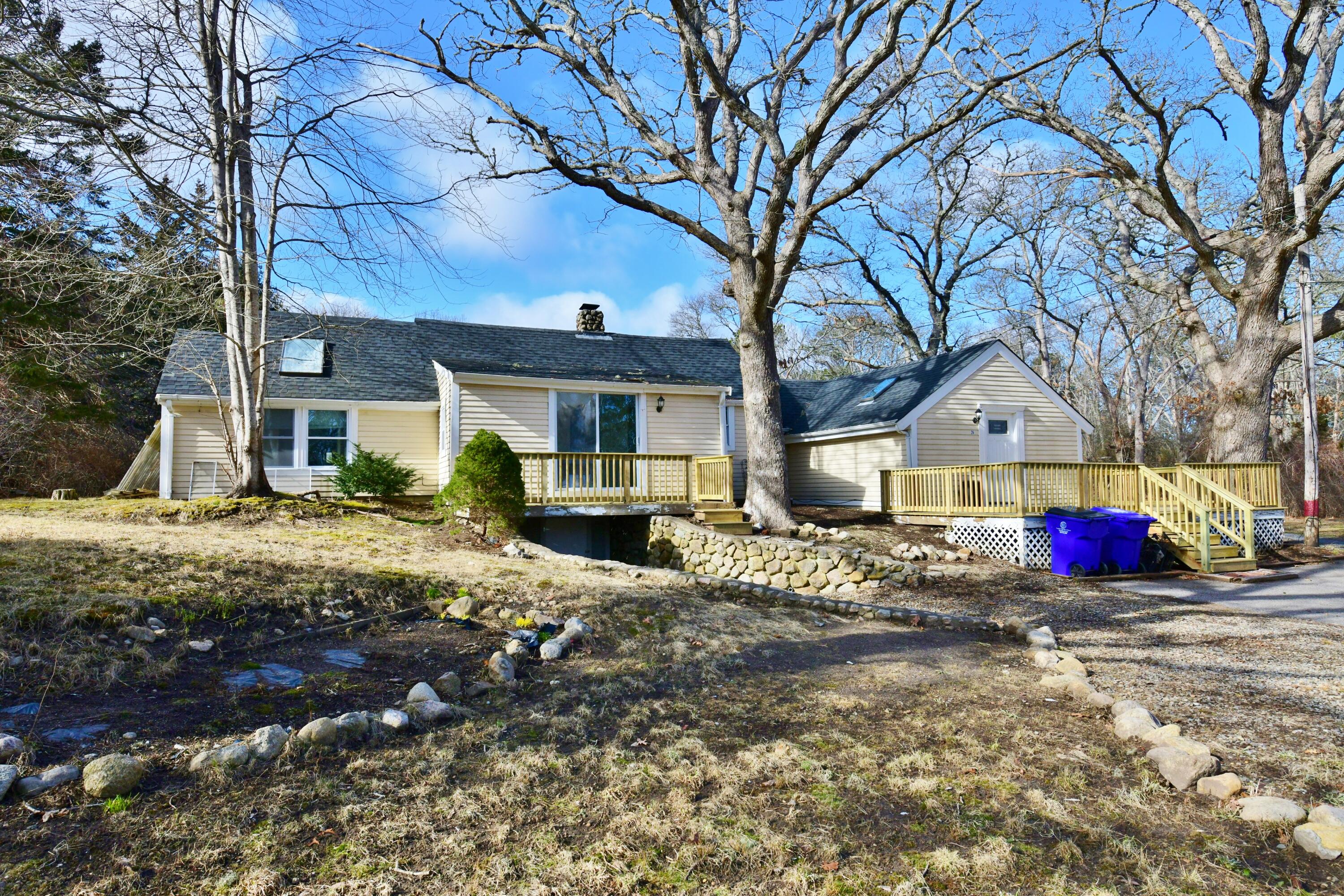26 Old Monument Neck Road Bourne, MA 02532 - Photo 2 of 51 a view of a house with a yard