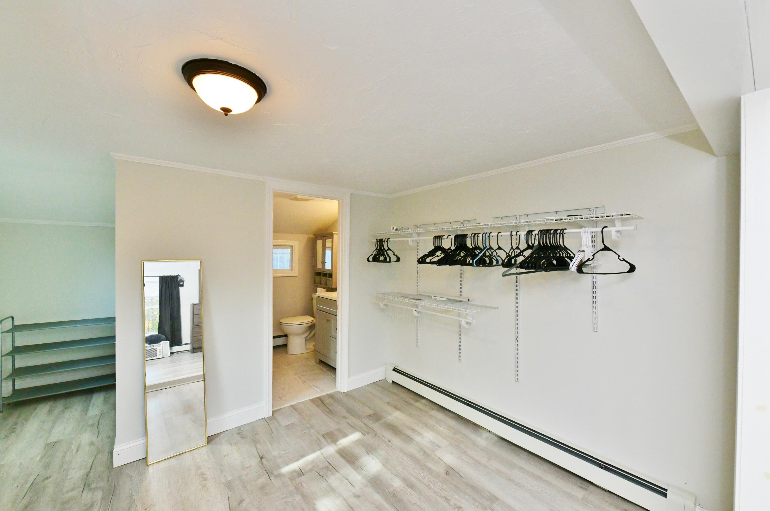 26 Old Monument Neck Road Bourne, MA 02532 - Photo 33 of 51 a view of a livingroom with wooden floor