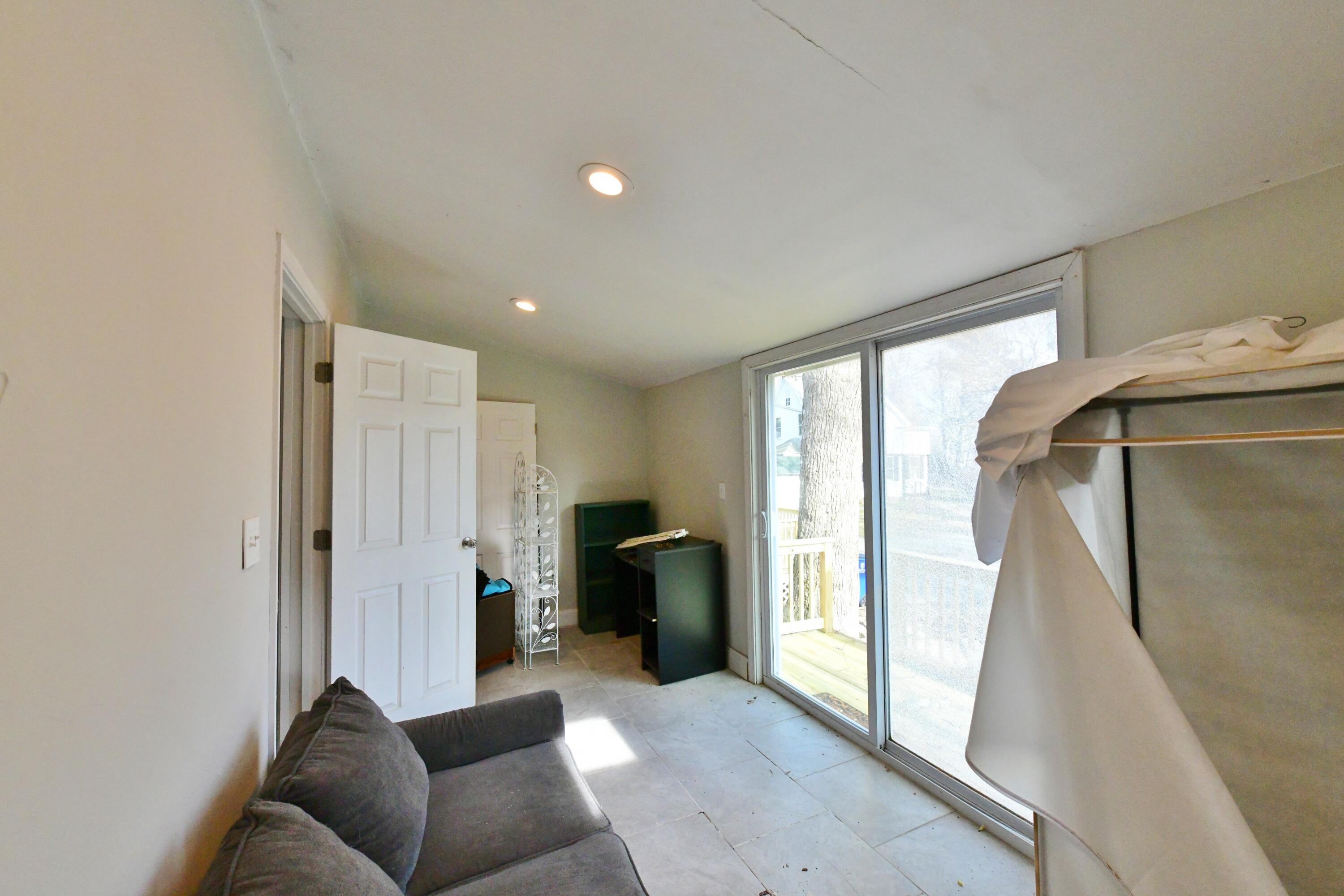 26 Old Monument Neck Road Bourne, MA 02532 - Photo 39 of 51 a living room with furniture and a window
