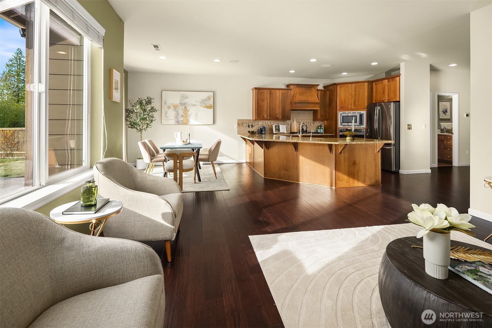 18214 41st Avenue Southeast Bothell, WA 98012 - Photo 12 of 40 a living room with furniture kitchen view and a large window