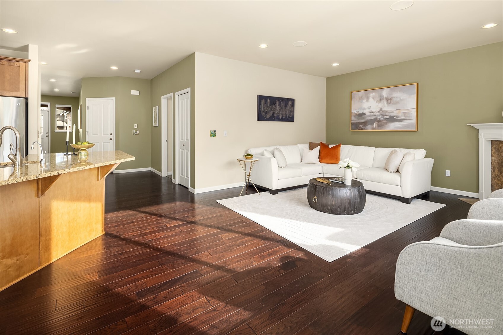 18214 41st Avenue Southeast Bothell, WA 98012 - Photo 14 of 40 a living room with furniture and a wooden floor