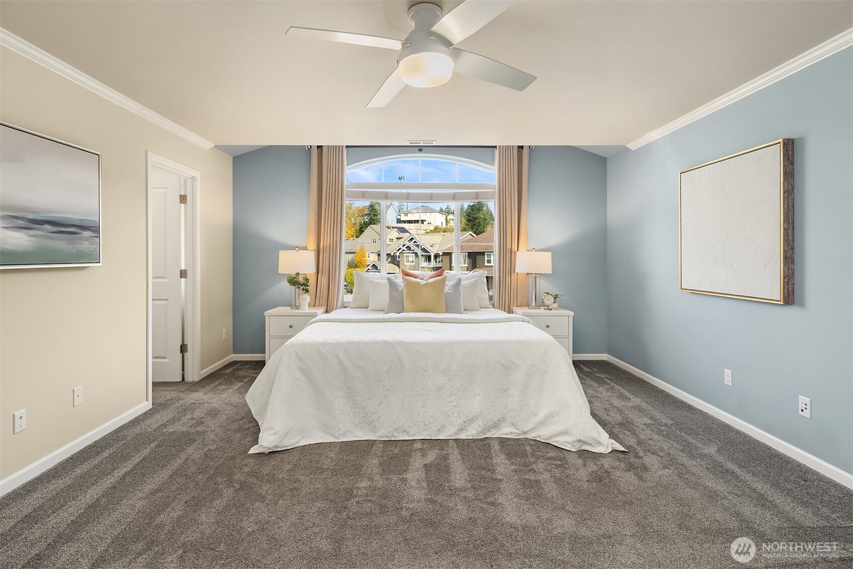 18214 41st Avenue Southeast Bothell, WA 98012 - Photo 18 of 40 a bedroom with a bed and painting on the wall