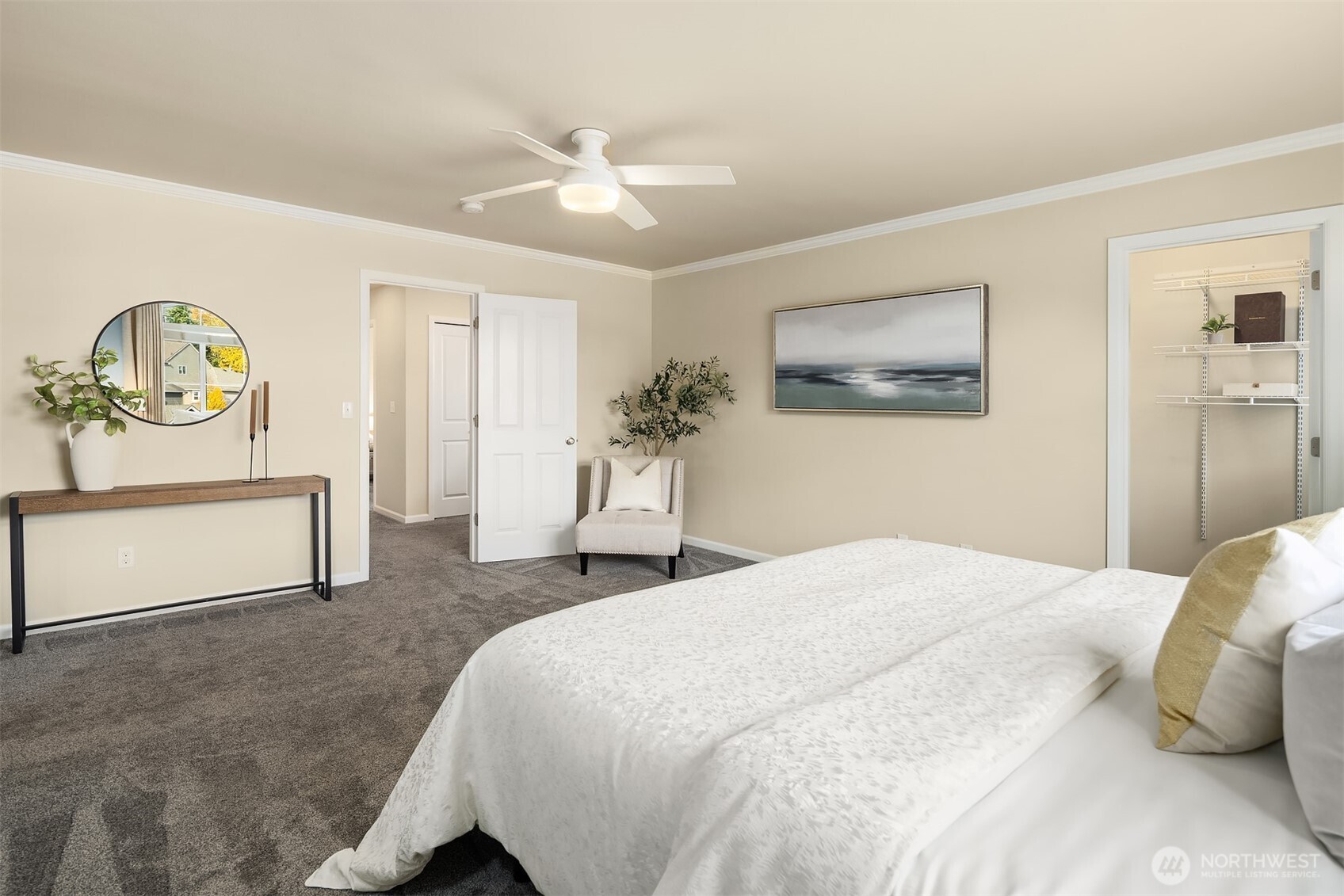 18214 41st Avenue Southeast Bothell, WA 98012 - Photo 20 of 40 a bedroom with a bed and a chandelier