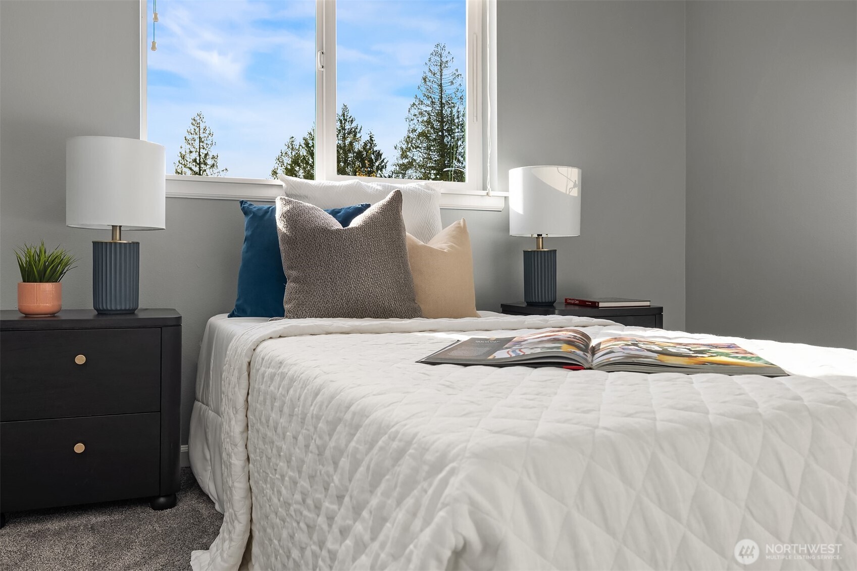 18214 41st Avenue Southeast Bothell, WA 98012 - Photo 26 of 40 a bedroom with a bed and window