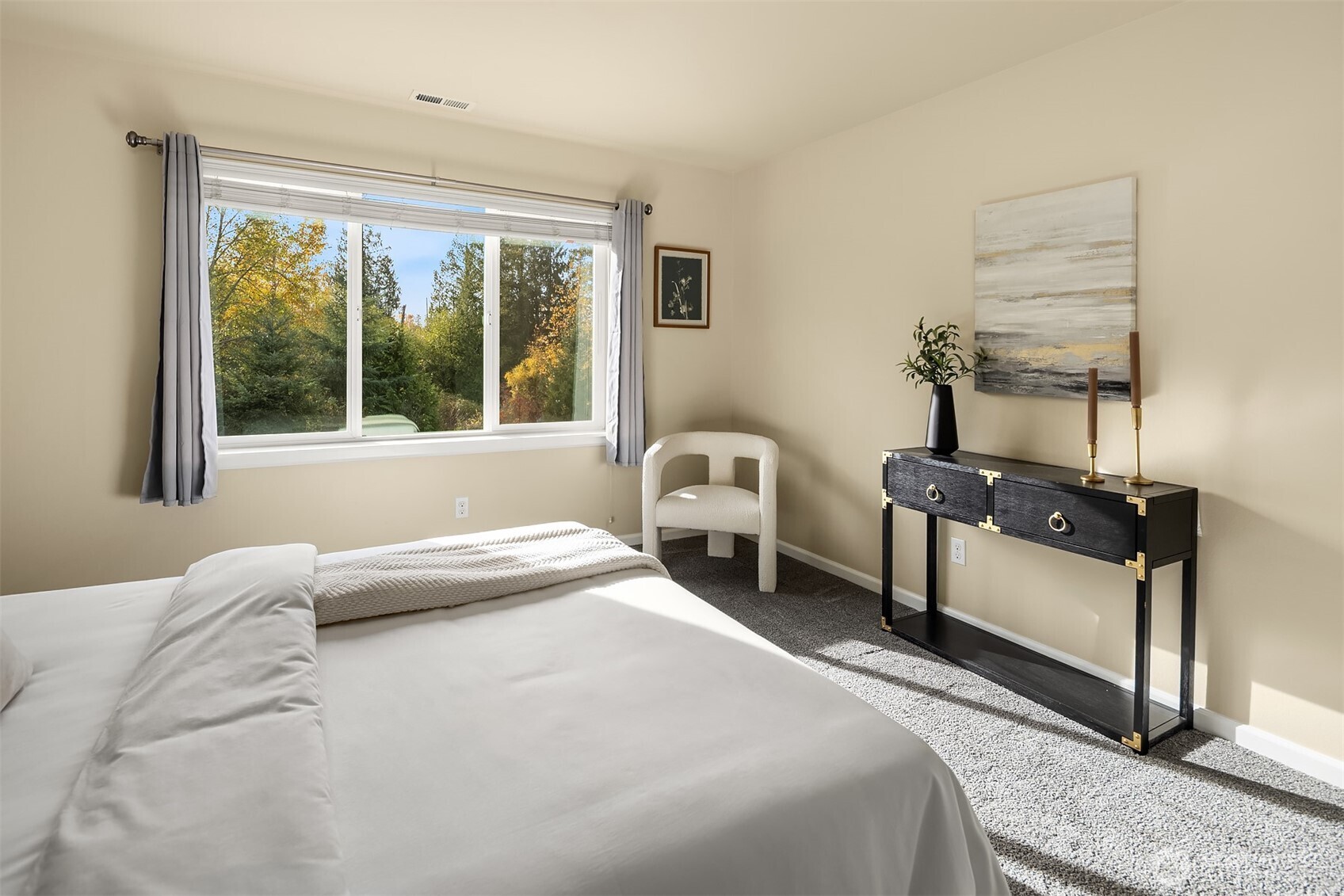 18214 41st Avenue Southeast Bothell, WA 98012 - Photo 30 of 40 a bedroom with a bed and a window