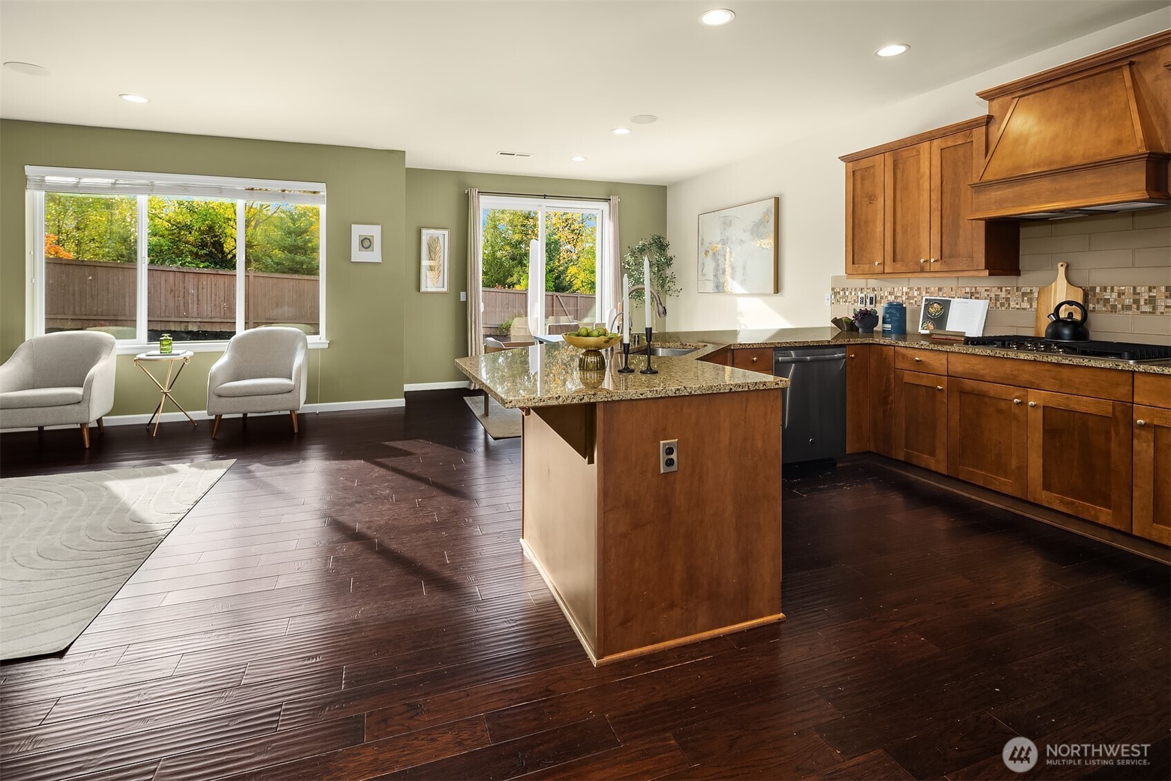 18214 41st Avenue Southeast Bothell, WA 98012 - Photo 3 of 40 a kitchen with sink stove and wooden floor