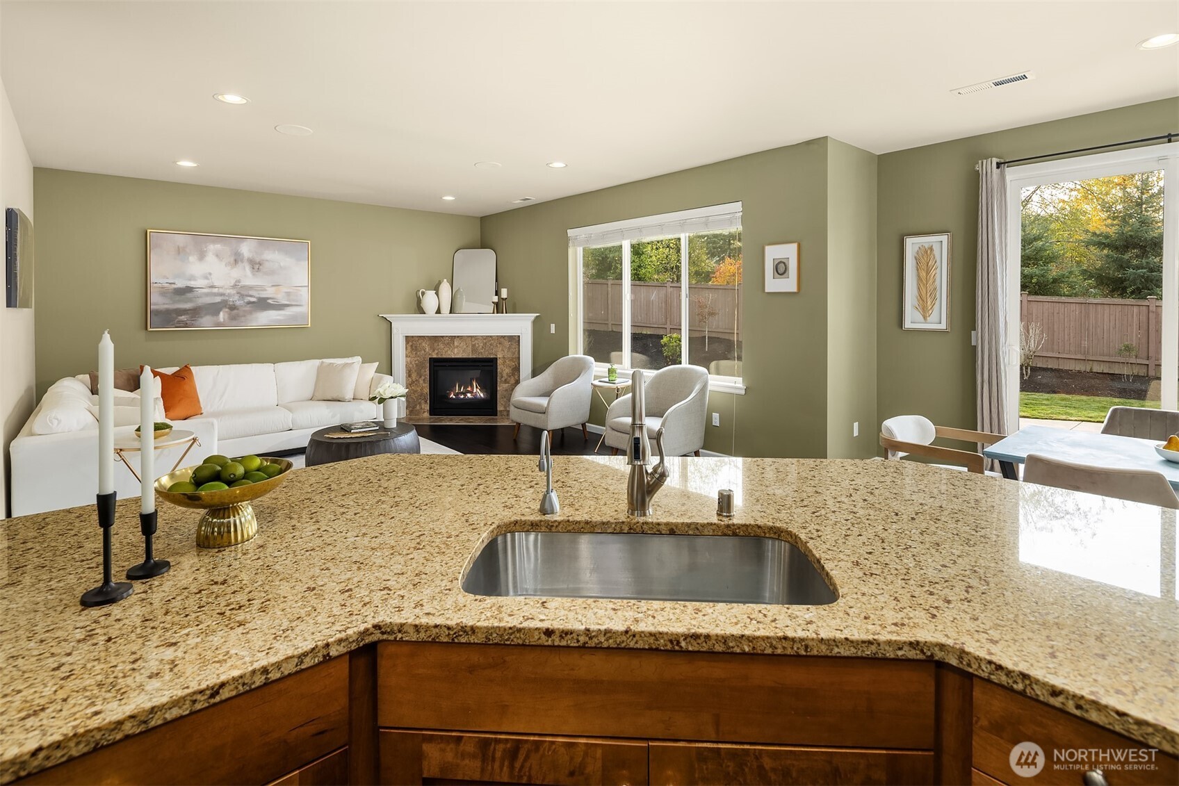 18214 41st Avenue Southeast Bothell, WA 98012 - Photo 7 of 40 a kitchen with granite countertop a sink and a counter top space