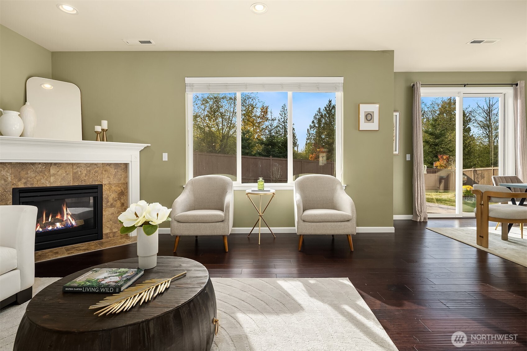 18214 41st Avenue Southeast Bothell, WA 98012 - Photo 10 of 40 a living room with furniture and a fireplace