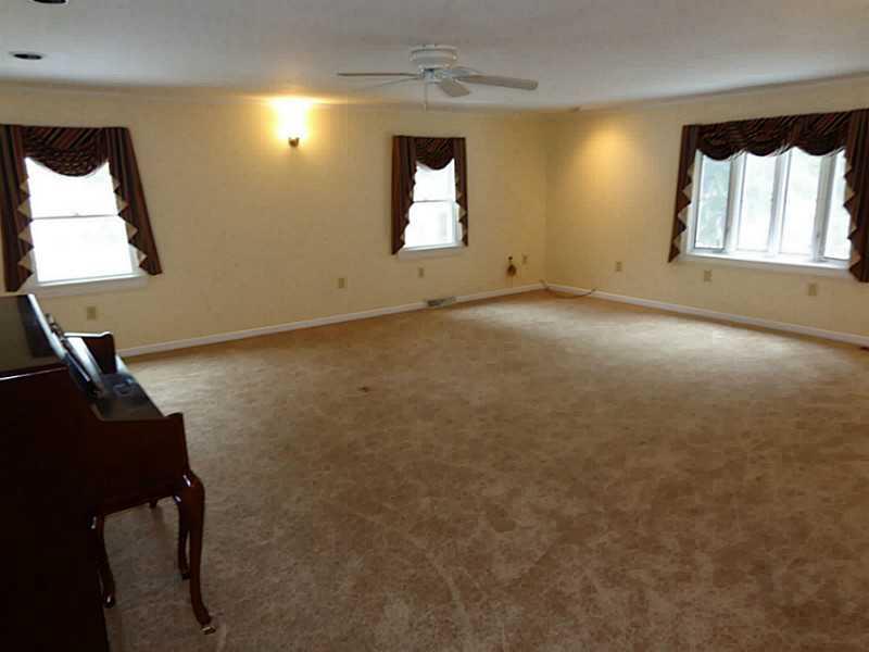 150 Donaldson Road Gibsonia, PA 15044 - Photo 10 of 25 Living Room. Large living room with an abundance of light that shines through the large windows