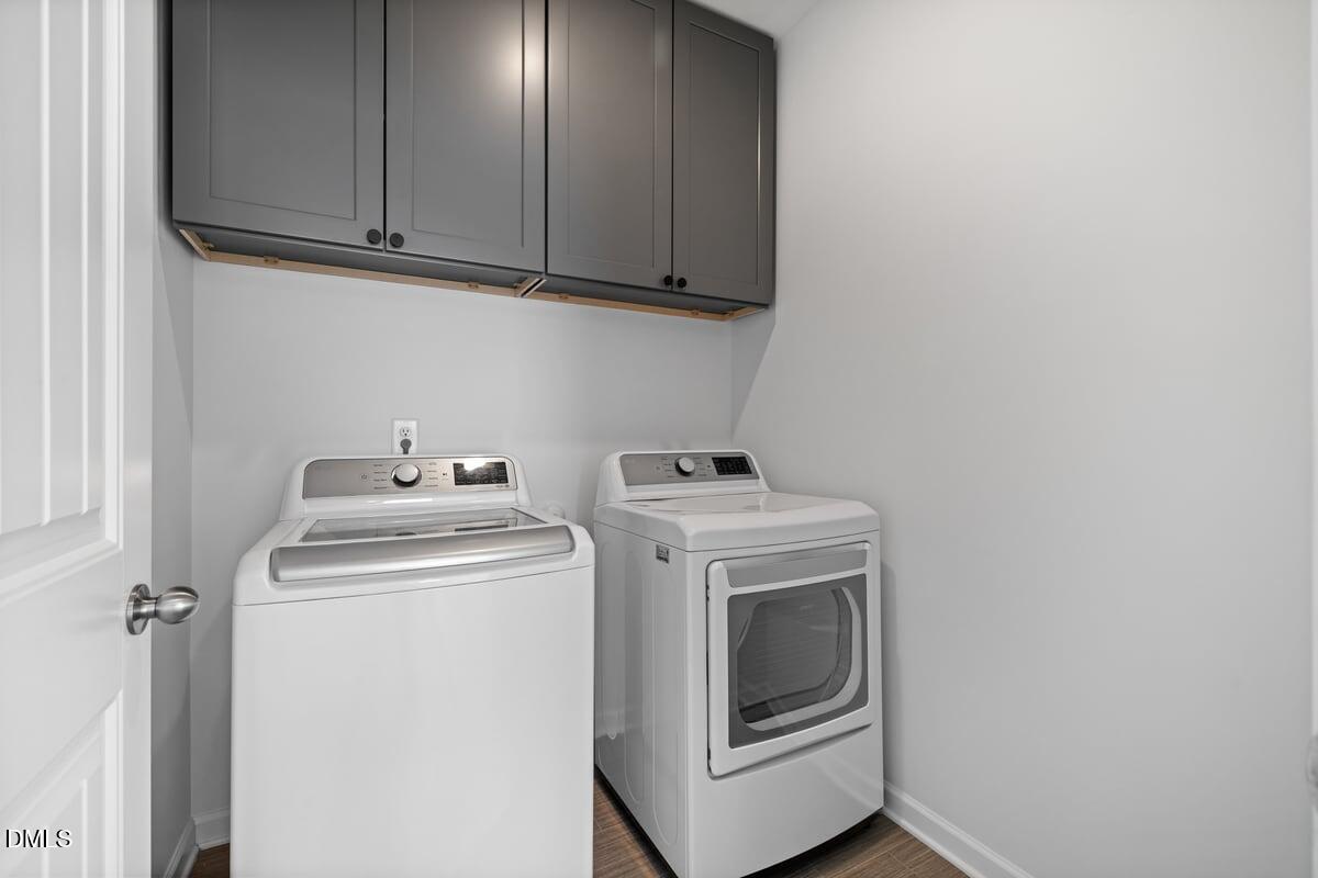 3616 Cross Timber Lane Raleigh, NC 27603 - Photo 14 of 39 a view of storage and utility room with washer and dryer