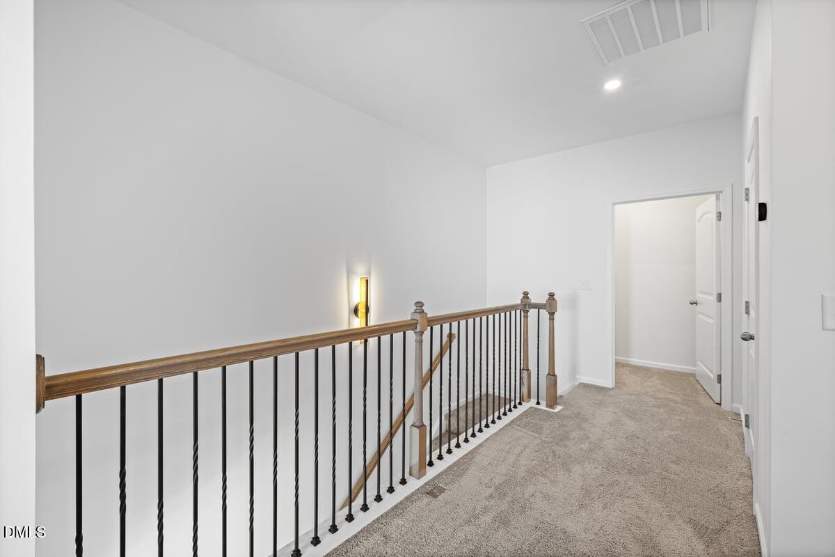 3616 Cross Timber Lane Raleigh, NC 27603 - Photo 21 of 39 a view of a hallway with a hallway