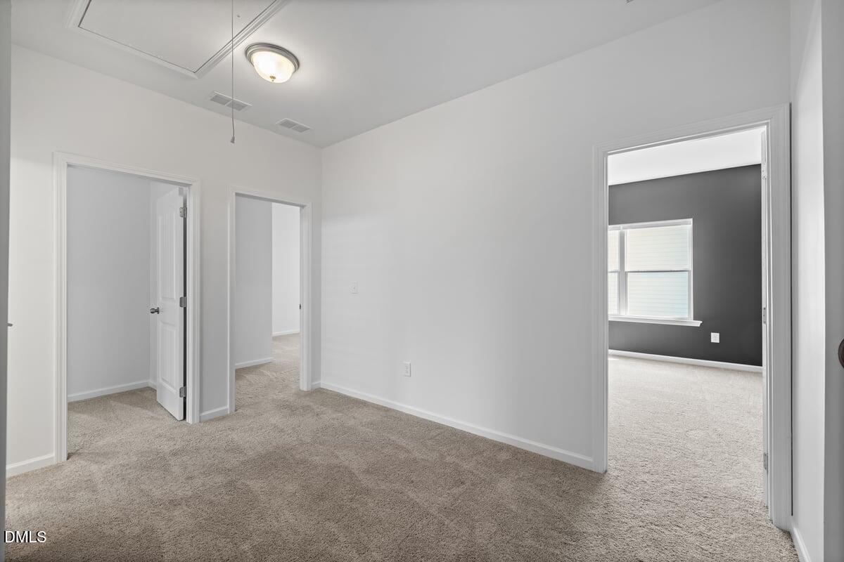 3616 Cross Timber Lane Raleigh, NC 27603 - Photo 22 of 39 an empty room with windows and closet