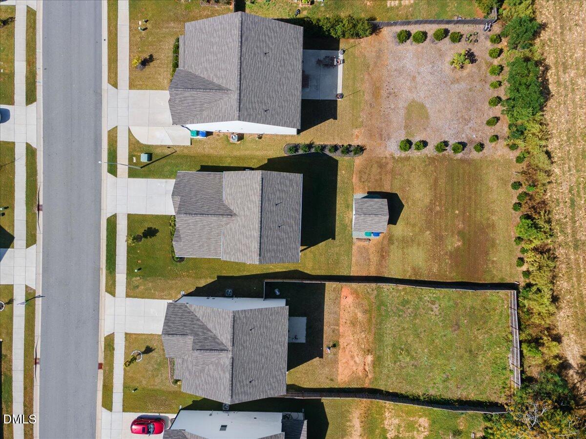 3616 Cross Timber Lane Raleigh, NC 27603 - Photo 32 of 39 an aerial view of a house with a swimming pool