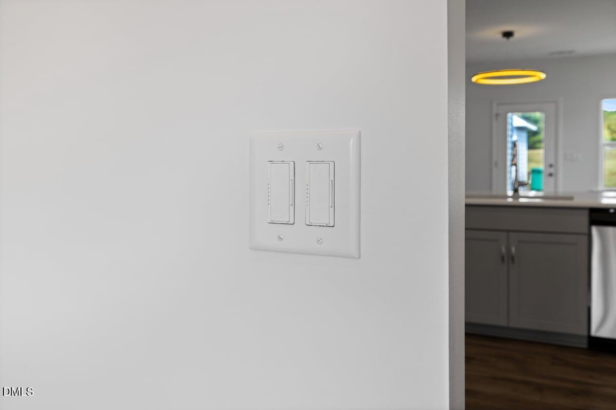 3616 Cross Timber Lane Raleigh, NC 27603 - Photo 6 of 39 a view of kitchen with wooden floor and window