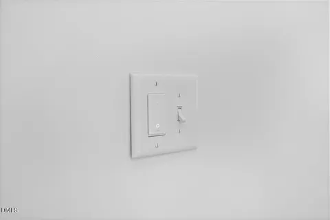 a view of kitchen with wooden floor and window