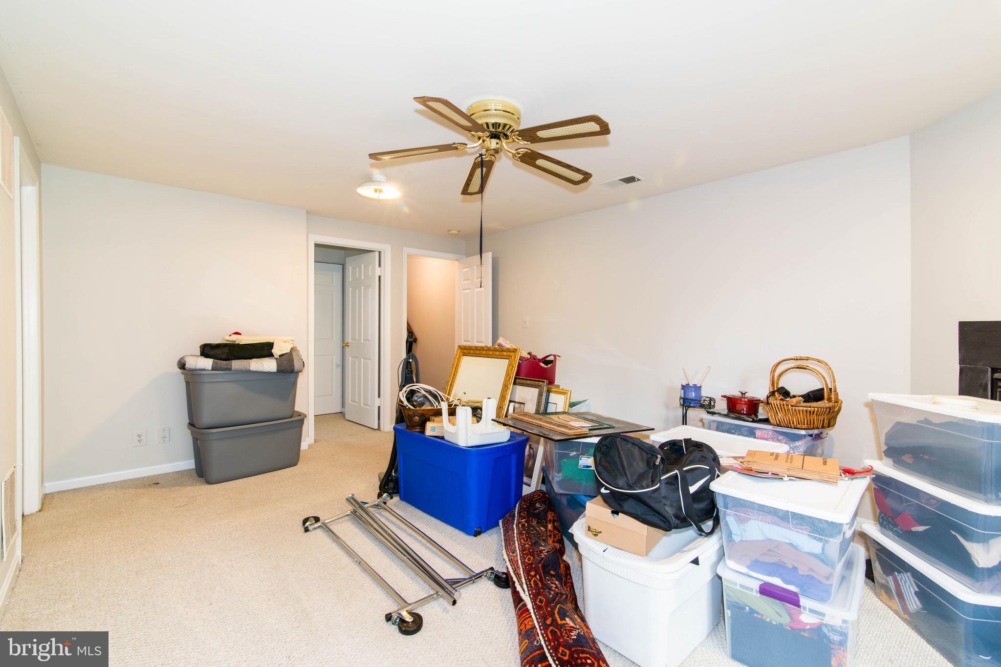 8 Travis Court Gaithersburg, MD 20879 - Photo 28 of 36 Recreation Room with Fireplace