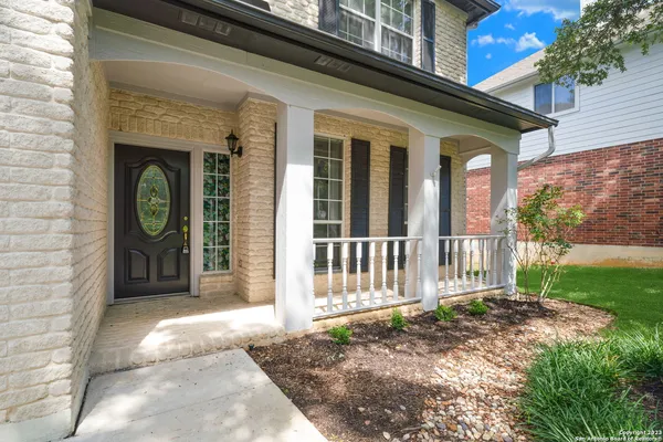 a front view of a house with a porch