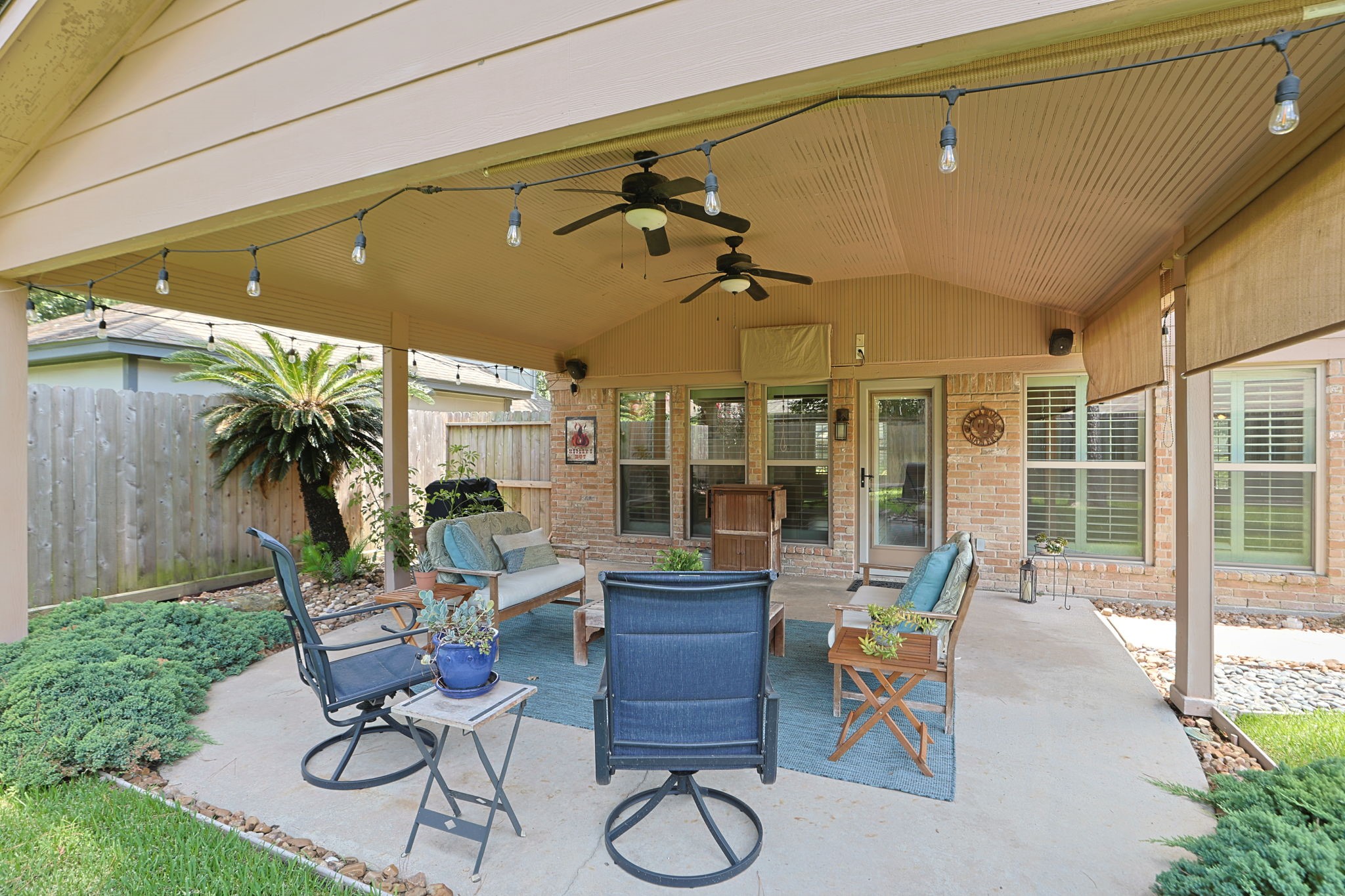3414 Flaming Candle Drive Spring, TX 77388 - Photo 41 of 50 COVERED PATIO - Such a pretty spot to relax or entertain. Party lights will remain.